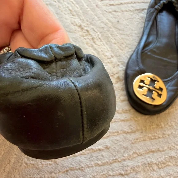 Tory Burch Black Flats with Gold Emblem - Picture 4 of 5